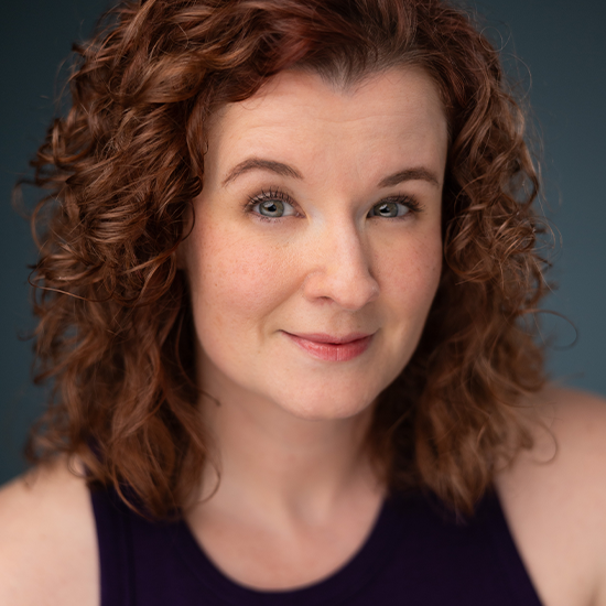 Jess Barbour in a portrait with a black tank top on.