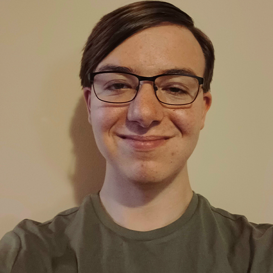 Chas Cser in an olive green t-shirt.