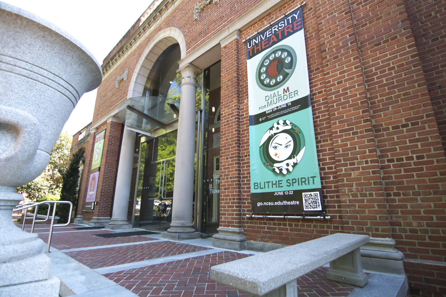 Front of Frank Thompson Hall with hanging TheatreFEST 2025 banner